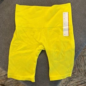 New neon yellow biker shorts
